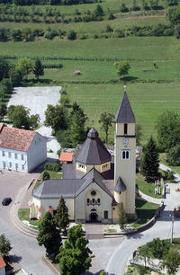 High angle view of road amidst buildings