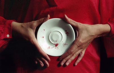 Close-up of human hand with tattoo