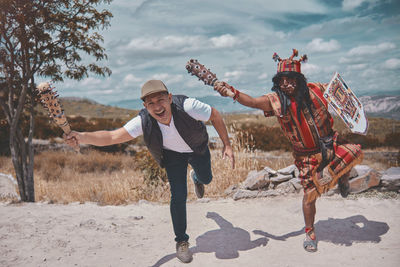 Representation of inca warrior dressed and with battle, prehispanic fighting with a tourist in peru