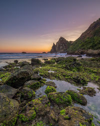 Scenic view of sea against sky during sunset