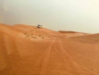 Scenic view of desert against sky