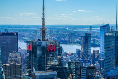 High angle view of buildings in city against sky