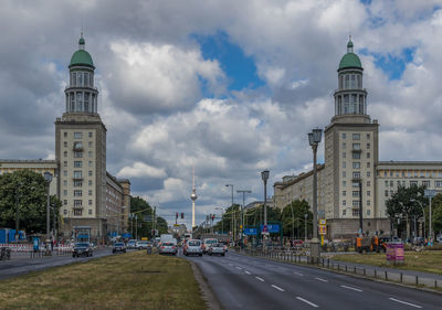 View of buildings against cloudy sky