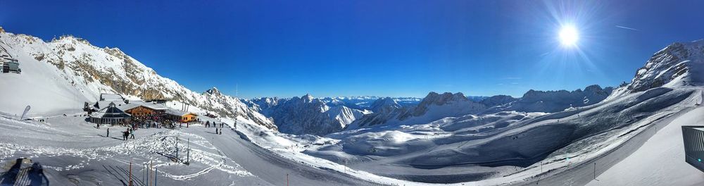 Aerial view of snowcapped mountain against sky