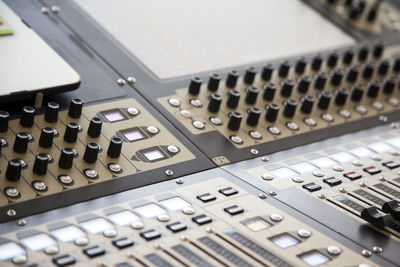 Full frame shot of sound mixer at recording studio