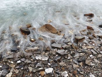 High angle view of stones on beach