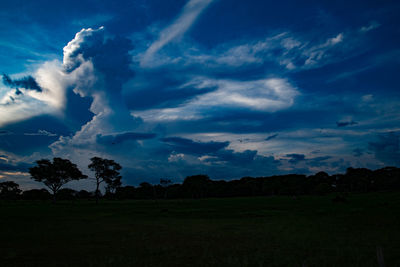 Scenic view of dramatic sky over land