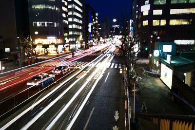 Light trails on city street at night