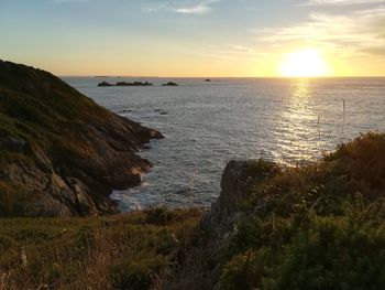 Scenic view of sea against sky during sunset