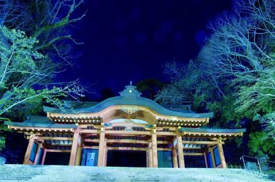 Building against blue sky at night