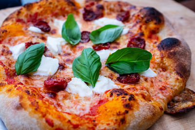 Close-up of pizza served in plate