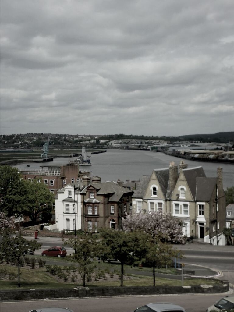 CLOUDY SKY OVER BUILDINGS