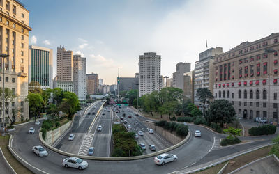 High angle view of buildings in city against sky