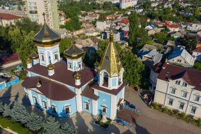 High angle view of street amidst buildings in town