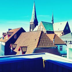 Low angle view of church against blue sky