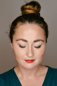 Close-up of woman with eyes closed