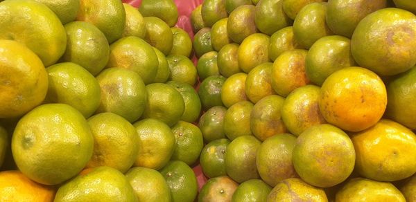 Full frame shot of lemons in market