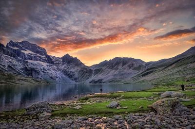 Scenic view of lake at sunset