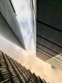 Low angle view of modern buildings against sky