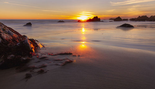 Scenic view of sea against sky during sunset