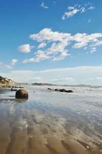 Scenic view of beach against sky