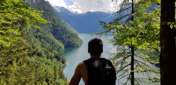 Rear view of man looking at mountains