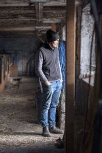 Full length of man standing in abandoned building
