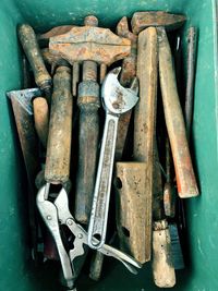 High angle view of tools in container