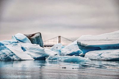 Scenic view of frozen sea against sky