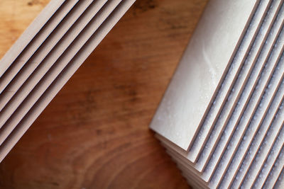 High angle view of white container on table