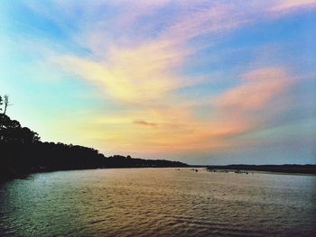 Scenic view of sea at sunset