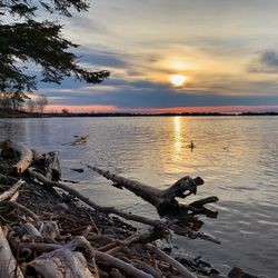 Scenic view of sunset over lake