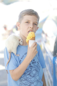 Boy holding ice cream