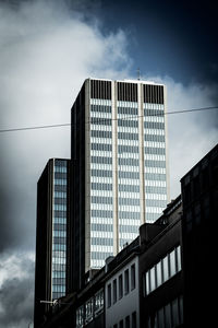 Low angle view of skyscrapers against sky