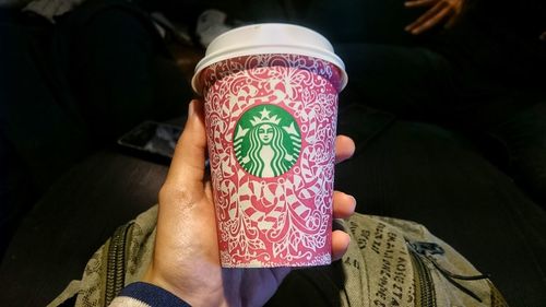 Midsection of woman holding hands