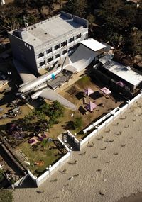 High angle view of buildings and trees in city