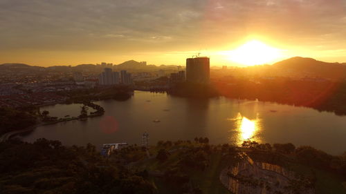 View of cityscape against sky during sunset