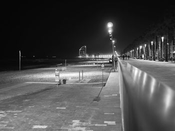 Illuminated promenade at night