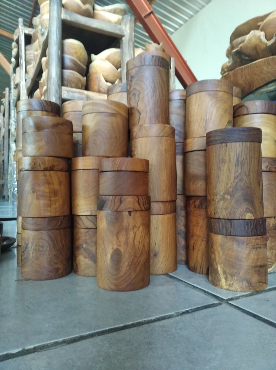 STACK OF FIREWOOD IN SHELF AT MARKET