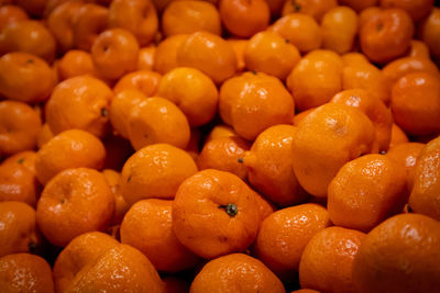 Full frame shot of oranges at market stall