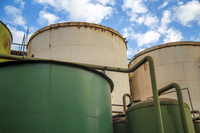 Low angle view of factory against sky