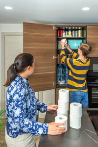 Side view of boy looking at home