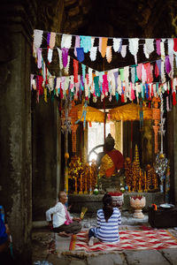 People sitting in temple