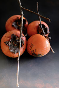 Close-up of orange fruits on table