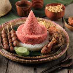 Cone shape red and white rice called nasi tumpeng same as indonesian national flag for 