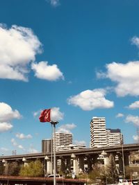 Low angle view of buildings against blue sky