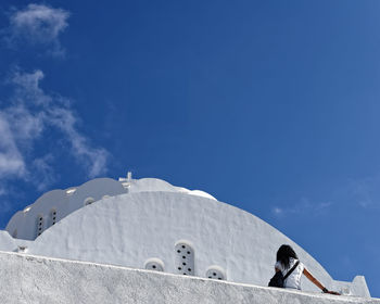 Low angle view of building against blue sky