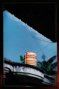 Low angle view of buildings against blue sky