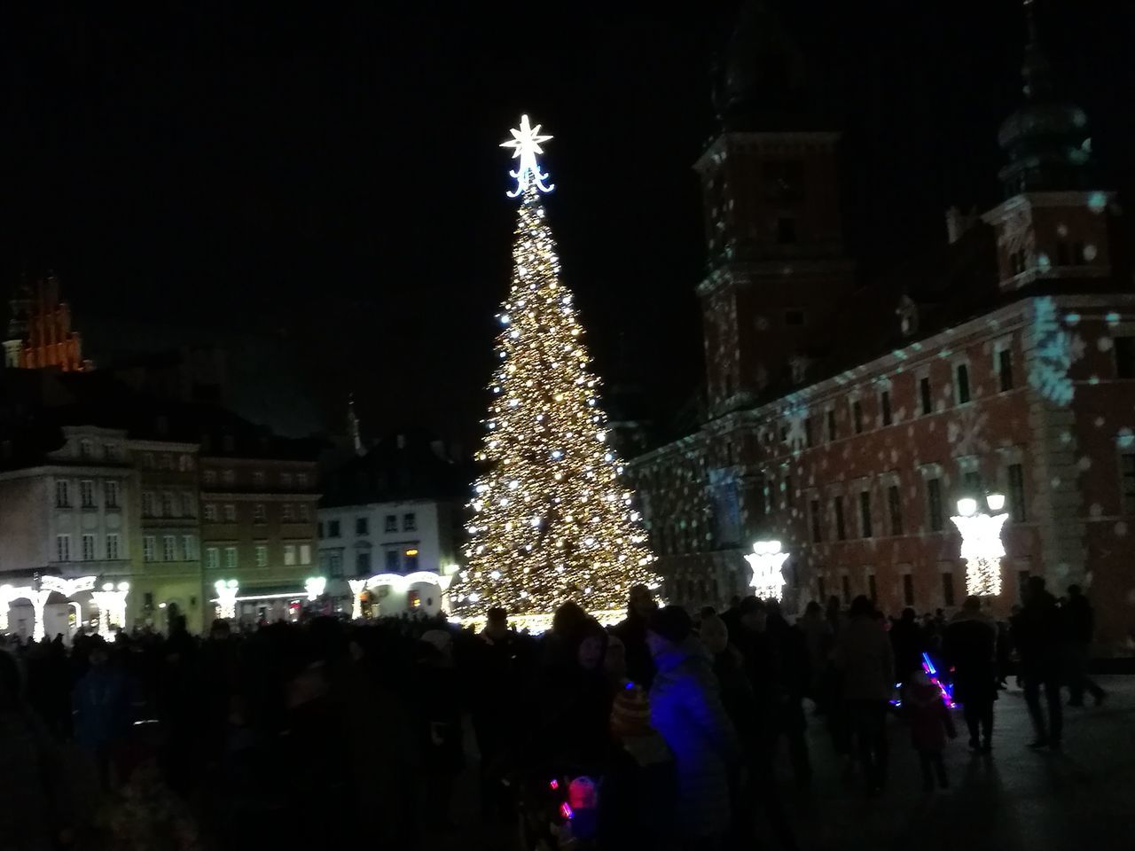 VIEW OF ILLUMINATED CHRISTMAS TREE AT NIGHT