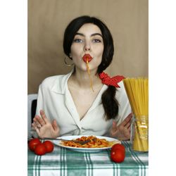 Portrait of woman eating food